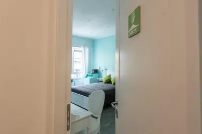Letto o letti in una camera di Suite Napoletana