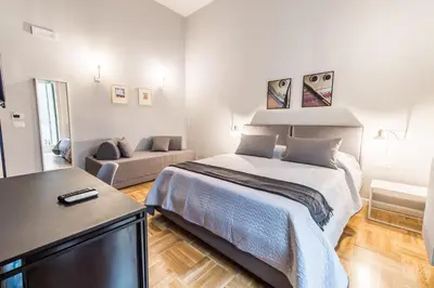 Letto o letti in una camera di Dama Suite