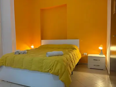 Letto o letti in una camera di B&B LA CONIGLIERA
