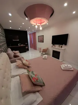 TV o dispositivi per l'intrattenimento presso Mayfair Lifestyle Suites by Babylon Stay