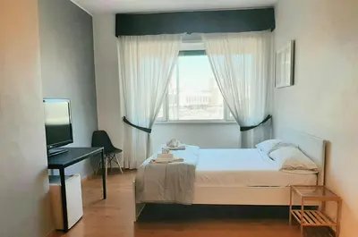 Letto o letti in una camera di Mayfair Lifestyle Suites by Babylon Stay