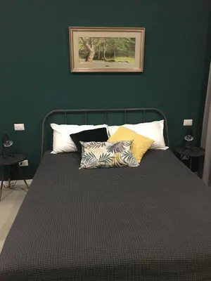 Letto o letti in una camera di Casa Roger