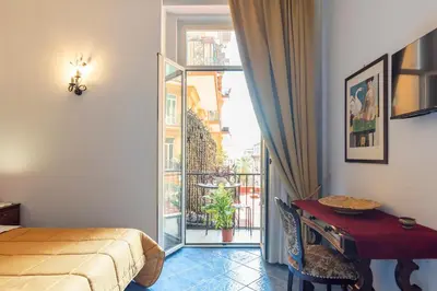 Letto o letti in una camera di B&B Le Stanze Dei Mille