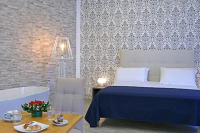Letto o letti in una camera di Barbarella Spa