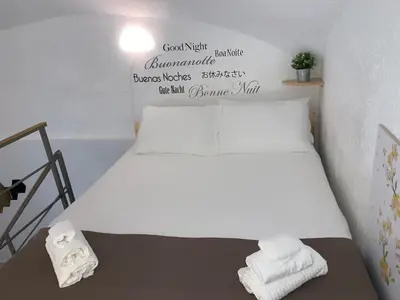 Letto o letti in una camera di Little Dream Residenza - Napoli