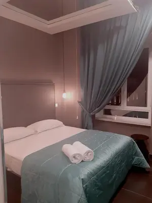 Letto o letti in una camera di Pit Stop Napoli Centrale