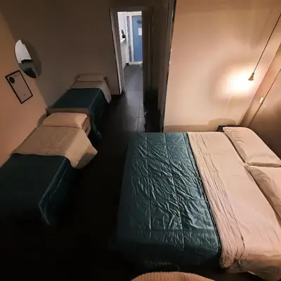 Letto o letti in una camera di Pit Stop Napoli Centrale