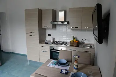 Cucina o angolo cottura di Casa del Porto al Borgo Marinari
