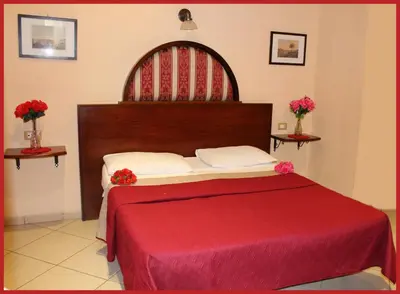 Letto o letti in una camera di B&B La Storia Di Napoli