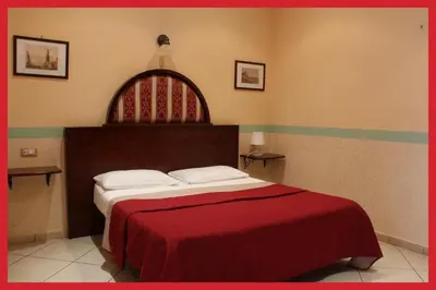 Letto o letti in una camera di B&B La Storia Di Napoli