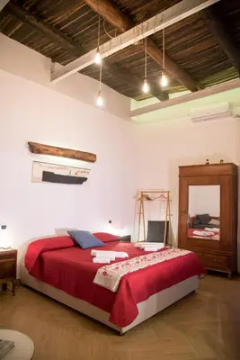 Letto o letti in una camera di Guest Art Napoli