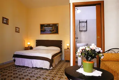 Letto o letti in una camera di B&B Domus Gemi