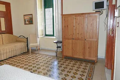 Letto o letti in una camera di B&B Domus Gemi
