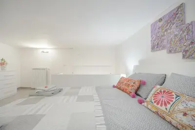 Letto o letti in una camera di MIRANDA APARTMENTS nel cuore del Vomero