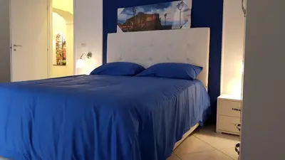 Letto o letti in una camera di Heart of Naples