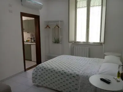 Letto o letti in una camera di Magic Napoli Green