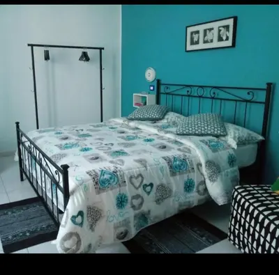 Letto o letti in una camera di Magic Napoli Green