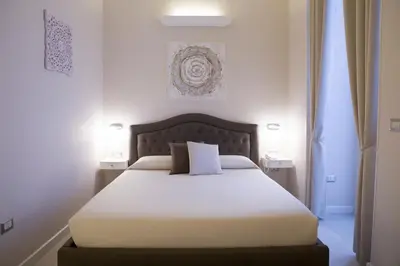 Letto o letti in una camera di Royal Rooms Luxury Suite