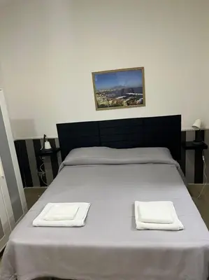 Letto o letti in una camera di Casa vacanza Da Totore