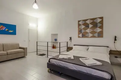 Letto o letti in una camera di Casa90 Room in Naples