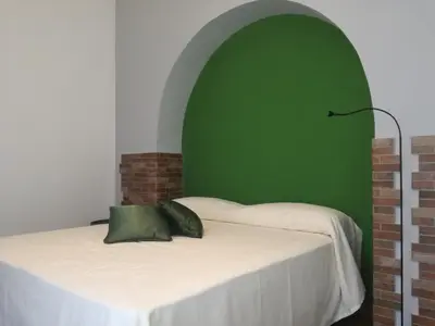 Letto o letti in una camera di Spira Mirabilis Napoli