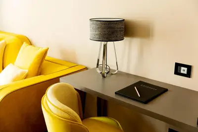 Area soggiorno di Amadomus Luxury Suites