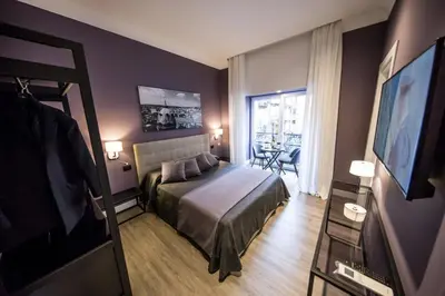 Letto o letti in una camera di B&B Art House