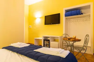 Letto o letti in una camera di B&B Trianon