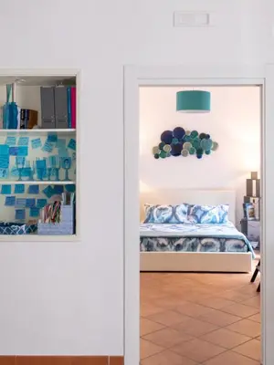 Letto o letti in una camera di Il Posto Fisso Napoli Plebiscito Chiaia