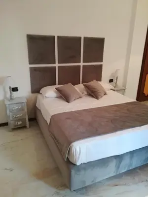 Letto o letti in una camera di Neapolis City Life