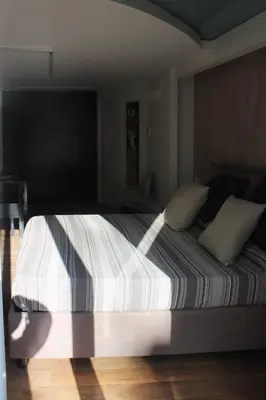 Letto o letti in una camera di The Queen's Room