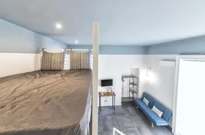 Letto o letti in una camera di Be Italian Flat Duomo 319