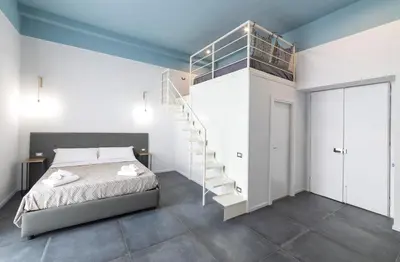 Letto o letti in una camera di Be Italian Flat Duomo 319