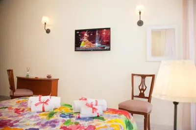 Letto o letti in una camera di b&b Napoli Capitale