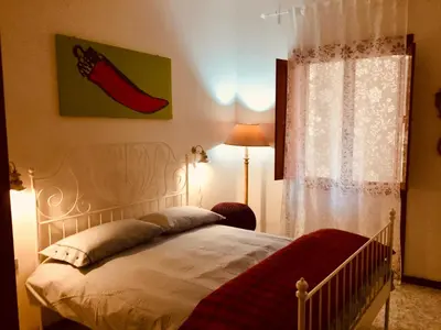 Letto o letti in una camera di Casa Gamilia
