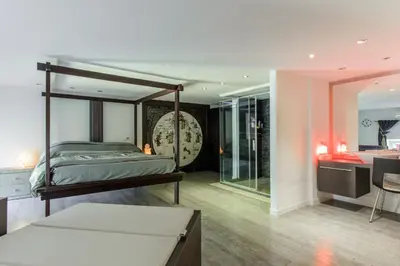 Letto o letti in una camera di luxury suite San Carlo