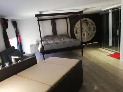 Letto o letti in una camera di luxury suite San Carlo