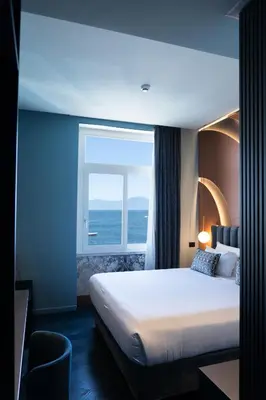 Letto o letti in una camera di Relais sul Mare Boutique Hotel