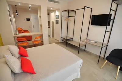 Letto o letti in una camera di Delco Naples
