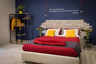 Letto o letti in una camera di B&B i Maestri