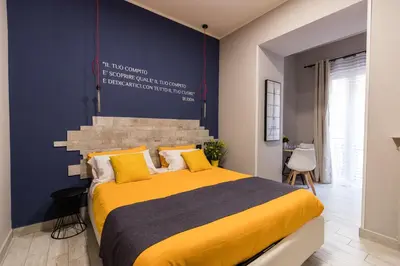 Letto o letti in una camera di B&B i Maestri