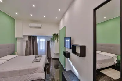 Letto o letti in una camera di Residenza Napoli Centrale