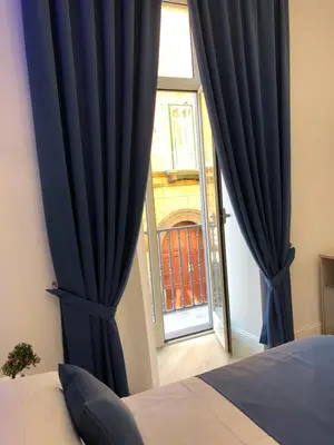 Letto o letti in una camera di DOMO B&B