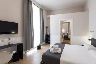 Letto o letti in una camera di Five Boutique Rooms