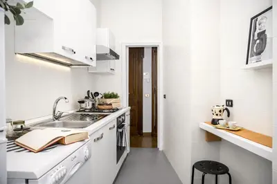 Cucina o angolo cottura di Casa Frangiò Modern Apartment Historical Centre - Authentic Neapolitan Apartment for Families and Friends