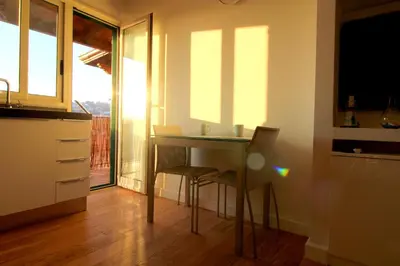 Cucina o angolo cottura di Suite Delicia Apartment - Appartamento con Terrazza
