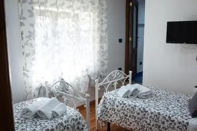 Letto o letti in una camera di Dimora De Curtis