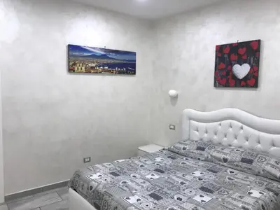 Letto o letti in una camera di Luishouse