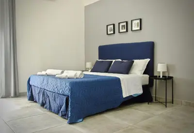 Letto o letti in una camera di BelleBBuono Suite