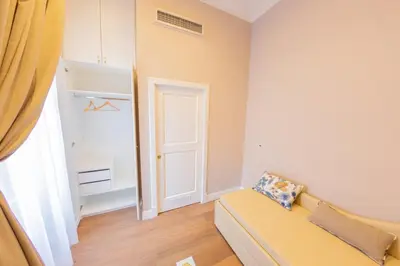 Letto o letti in una camera di Suite CuoreNapoletano